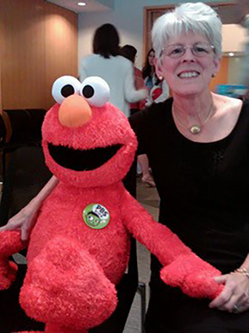 Suzanne Barchers at a PBS Next Generation Media Advisory Board Meeting with Elmo